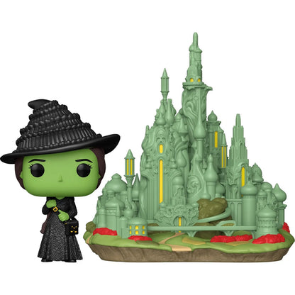 Wicked Funko Pop! Town #44 unboxed Elphaba figure in a black witch hat and dress beside the Emerald City display