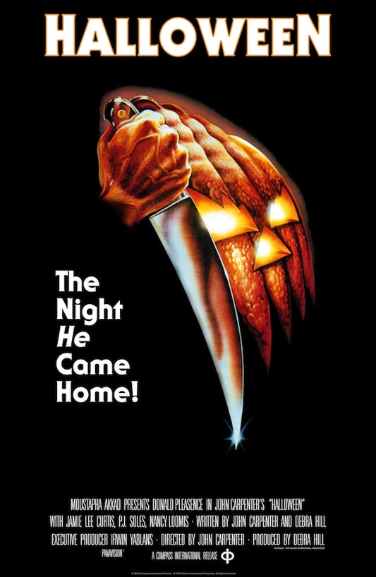 Halloween The Night He Came Home movie poster featuring a hand clutching a large knife