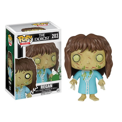 The Exorcist Regan Funko Pop! Vinyl Figure #203 shown beside its retail box, with Regan wearing a blue dress